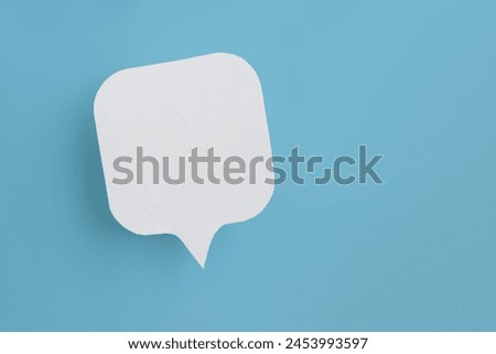 Conceptual image about communication and social media, customer feedback, real blank white speech bubble paper cut on grunge blue color background