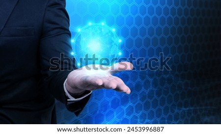 Portrait of businessman showing virtual global network communication on his hand with digital background