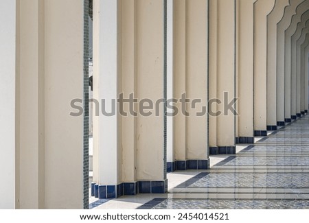 Interior diminishing perspective view of pillars and hallway in Bang O Mosque. Space for text, Selective focus. Royalty-Free Stock Photo #2454014521