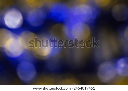 Defocused neon glow. Overlaying highlights. Futuristic abstract LED illumination. Neon colors blur on dark abstract background