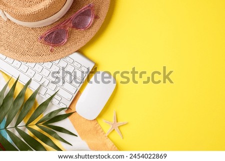 Top-view image combining work and leisure with a keyboard and beach accessories on a sunny yellow backdrop, ideal for remote work during the summer season