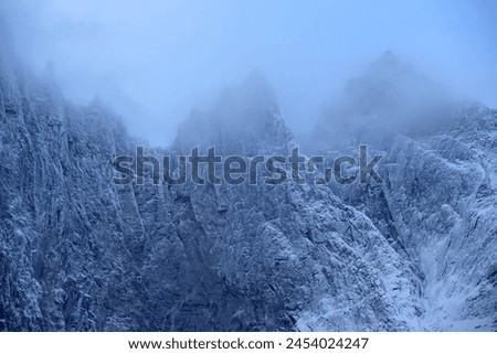 Trollveggen mountains in winter (Norway). Royalty-Free Stock Photo #2454024247