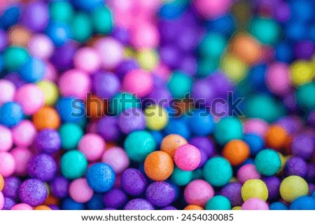 colorful small balls, abstract background.