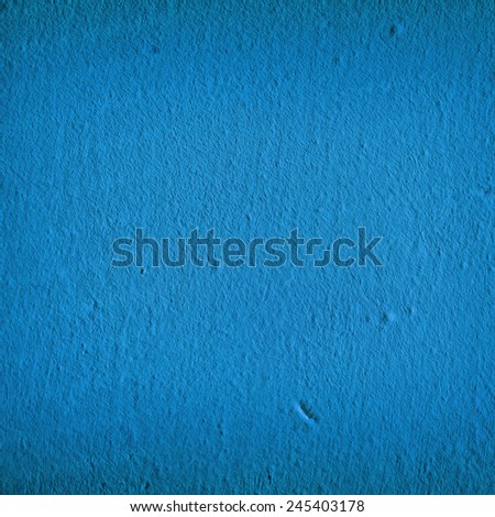 Grain blue paint wall background or texture 