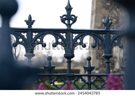 The craftsmanship of a beautifully designed fence, with a focus on the center pattern