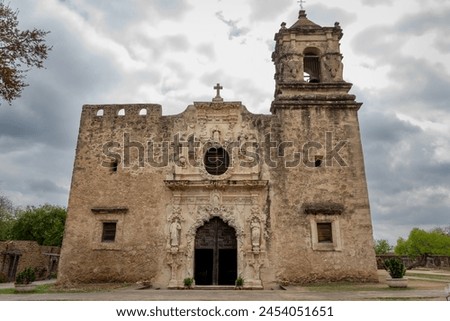 Traditional stone architecture of the old Mission San Jose located at the San Antonio Mission Historical Park in San Antonio Texas. Picture is taken on a cloudy overcast day