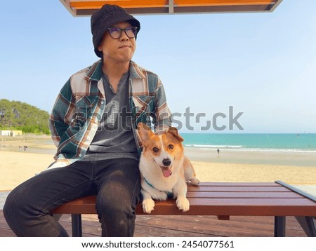 Men with dog happy family picture Welsh corgi puppy stock photo