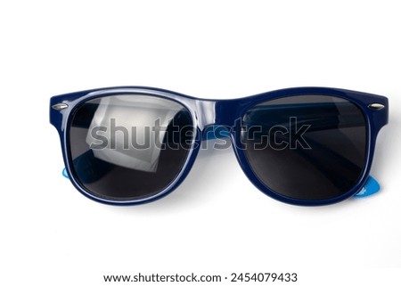 Blue sunglasses isolated on white background. Selective focus and shallow depth of field