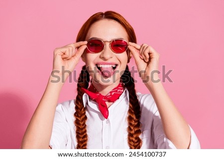 Photo of sweet tricky lady dressed cowboy outfit arms dark red eyewear stick out isolated pink color background Royalty-Free Stock Photo #2454100737