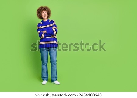 Photo of gorgeous lovely woman wear blue striped stylish clothes look up empty space isolated on green color background