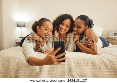 Women, selfie and friends in a home with profile picture, social media and smile at sleepover. Mobile, bonding and sister love in a bedroom with group, care and memories on a bed with digital app