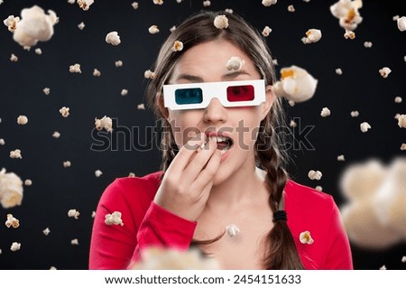 Woman, 3d glasses and portrait with popcorn for snack, eating or watching movie in black studio background. Female person, food and futuristic with color lens eyewear in cinema for film or hologram