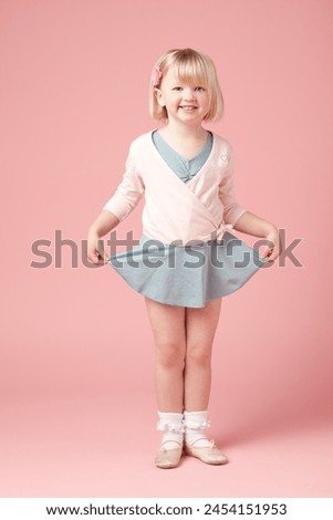 Portrait, child or girl by pink background for ballet, training and practice dance with smile in studio. Mockup space, ballerina or little kid for creativity, childhood development and performance