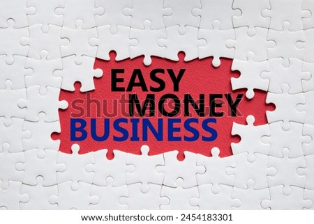 Easy Money Business symbol. Concept words Easy Money Business on white puzzle. Beautiful red background. Business and Easy Money Business concept. Copy space.