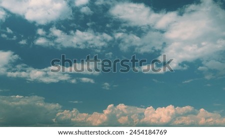 Background Of Light Calm Clouds Changes Shape. Clouds Running Across Blue Sky. Heavenly Cloud Sky Nature Scenery.