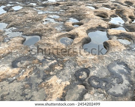 Sandstone erosion texture for background Royalty-Free Stock Photo #2454202499