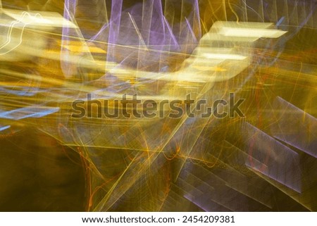 Abstract experimental surreal photography, long exposure, city and vehicle lights. Quantum physics. Texture for background. Wave motion of light. Representative photographs of particle physics.