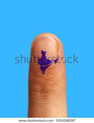 Male Indian Voter Hand with a voting sign or ink as Indian map on sky blue background  Royalty-Free Stock Photo #2454248387