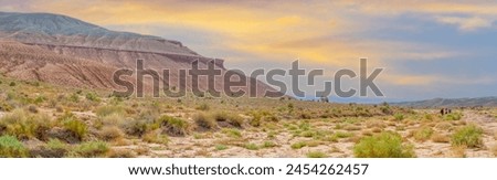 Breathtaking panoramic views of the Boguty Red Mountains Quiet sentinels created by centuries-old forces of nature Calm and serene desert landscape