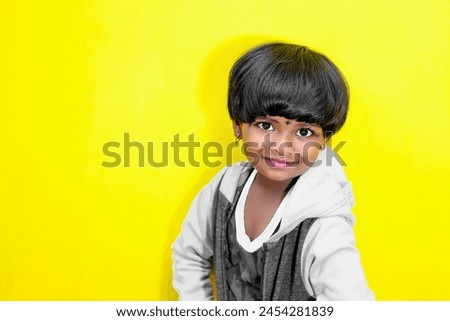Close-up portrait of her she nice-looking attractive lovely sweet curious cheerful cheery smart clever girl creating new idea solution fantasize copy space happy child isolated yellow color background