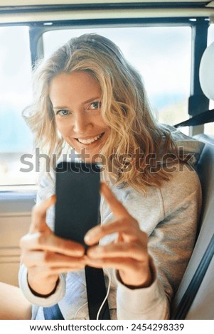 Woman, portrait and phone in car for photo, memory and road trip while on vacation or travel. Female person, smile and smartphone in vehicle for picture, fun and adventure while on holiday in Arizona