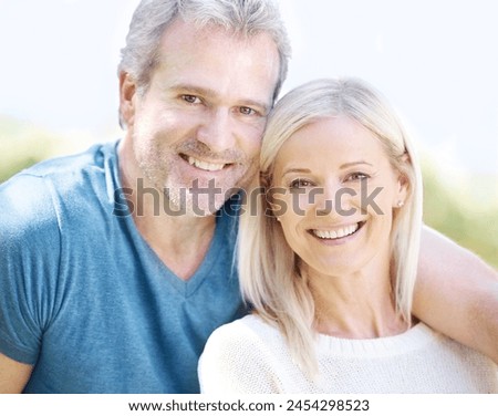 Couple, portrait and hug in outdoor nature, vacation and bonding on anniversary for love. Mature people, happy date and care in embrace for affection in marriage, countryside and together in garden