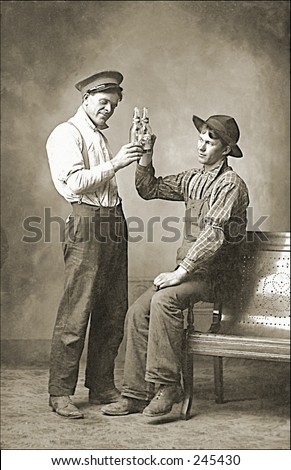 Vintage Photo of Two Men Toasting With Beer