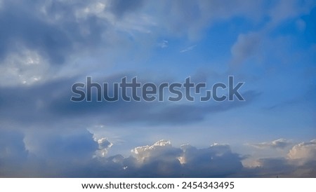 A picture of blue sky cloud gradient light white background. Beauty cloudy in sunshine calm bright air background. Gloomy vivid cyan landscape in environment day horizon skyline view 