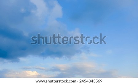 A picture of blue sky cloud gradient light white background. Beauty cloudy in sunshine calm bright air background. Gloomy vivid cyan landscape in environment day horizon skyline view 