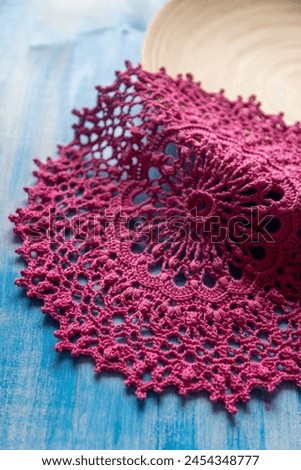 Pink crochet doily. This photo has been taken in Prague, 2024