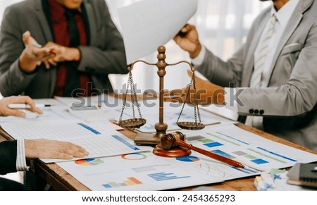 law concept The legal officer listening to the law report of booster and adjusting the agreement paper by writing it down