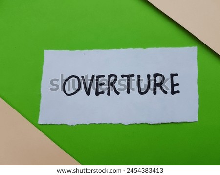 Overture writting on paper background.