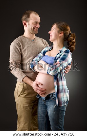Portrait of a happy pregnant couple