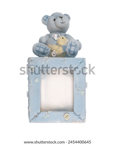 children photo frame with bear toy isolated on white background