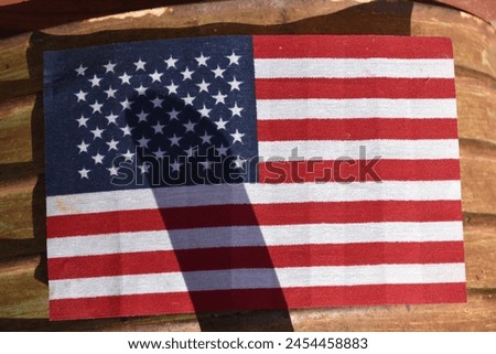 American flag with rusty metal background