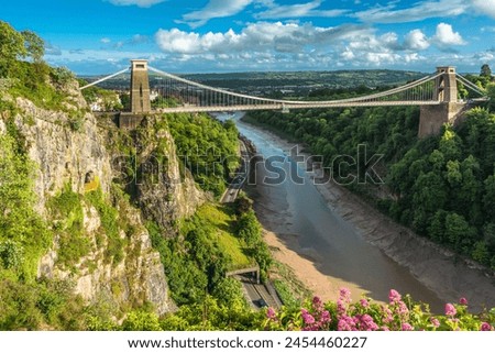 Historic Clifton Suspension Bridge by Isambard Kingdom Brunel spans the Avon Gorge with River Avon below, Bristol, England, United Kingdom, Europe Royalty-Free Stock Photo #2454460227