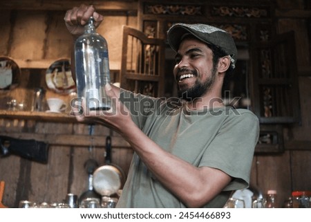a man checking a vodka bottle,vintage concept