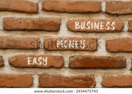 Easy money business symbol. Concept words Easy money business on beautiful brown brick. Beautiful brown brick wall background. Easy money business concept. Copy space.