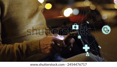 Image of a web of connections with medical icons over biracial man using smartphone. Digital online security computer interface concept digitally generated
