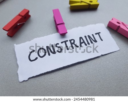 Constraint writting on table background. Royalty-Free Stock Photo #2454480981