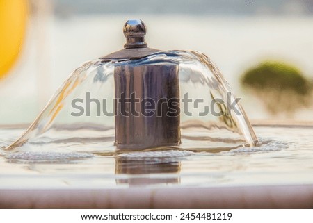 Abstract Art Photography, water fountain flow, blurred background, imagination concept of artistic illusion, shot is selective focus with shallow depth of field, taken at Cairo Egypt Royalty-Free Stock Photo #2454481219