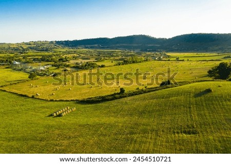 Valley in Italy during hay harvest, desktop background