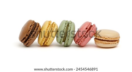 Variations of colorful macaroons isolated on white background