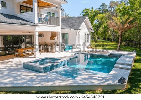 New home beautiful backyard with custom pool with fire pit 