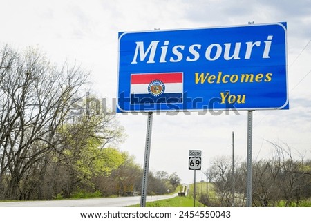 Missouri Welcomes You - a roadside sign on a rural highway near Lamoni, Idaho.