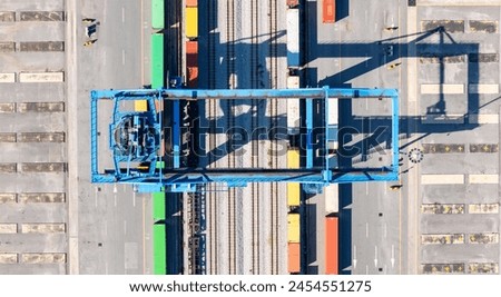 RTG cranes are lifting containers at the port.

 Royalty-Free Stock Photo #2454551275