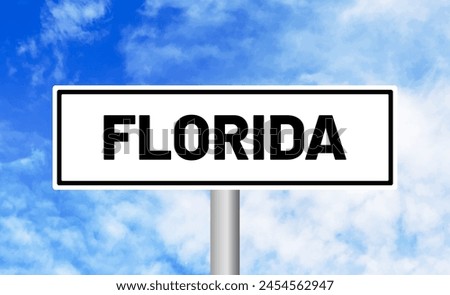 Florida road sign on sky background