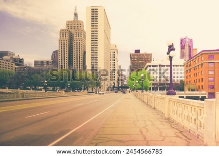 St. Paul City in Minnesota retro-style skyline landscape over the Robert Street Bridge and Mississippi River in the Upper Midwestern United States