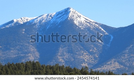 Snowcapped Mt. Humphreys near Flagstaff.  Main feature of the San Francisco Peaks Royalty-Free Stock Photo #2454574141