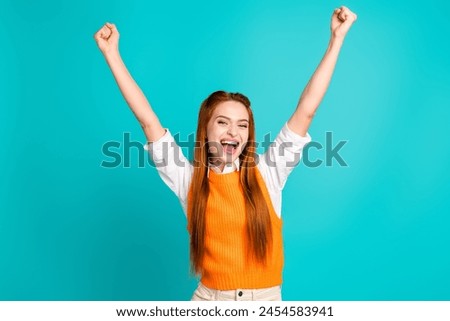 Photo of lovely adorable cheerful girl wear trendy orange outfit rejoce say scream yes isolated on cyan color background Royalty-Free Stock Photo #2454583941